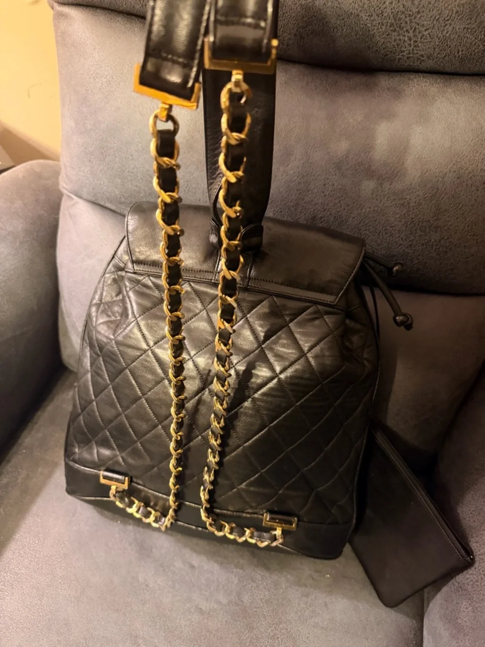 Vintage 24K CHANEL Black Quilted Leather Backpack with Gold CC Medallion